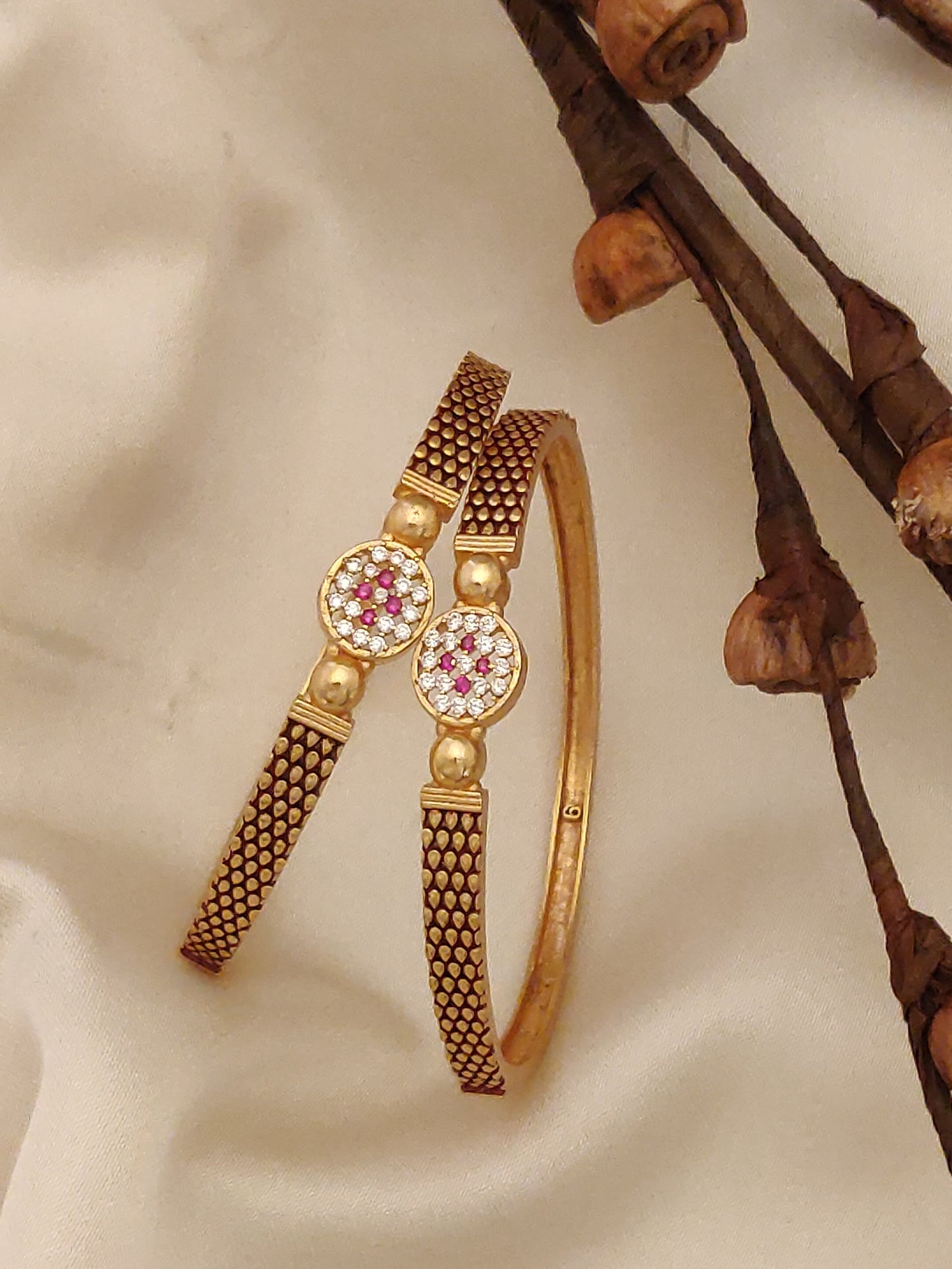 Elegant Gold-Plated Designer Bangles with CZ & Ruby Stones