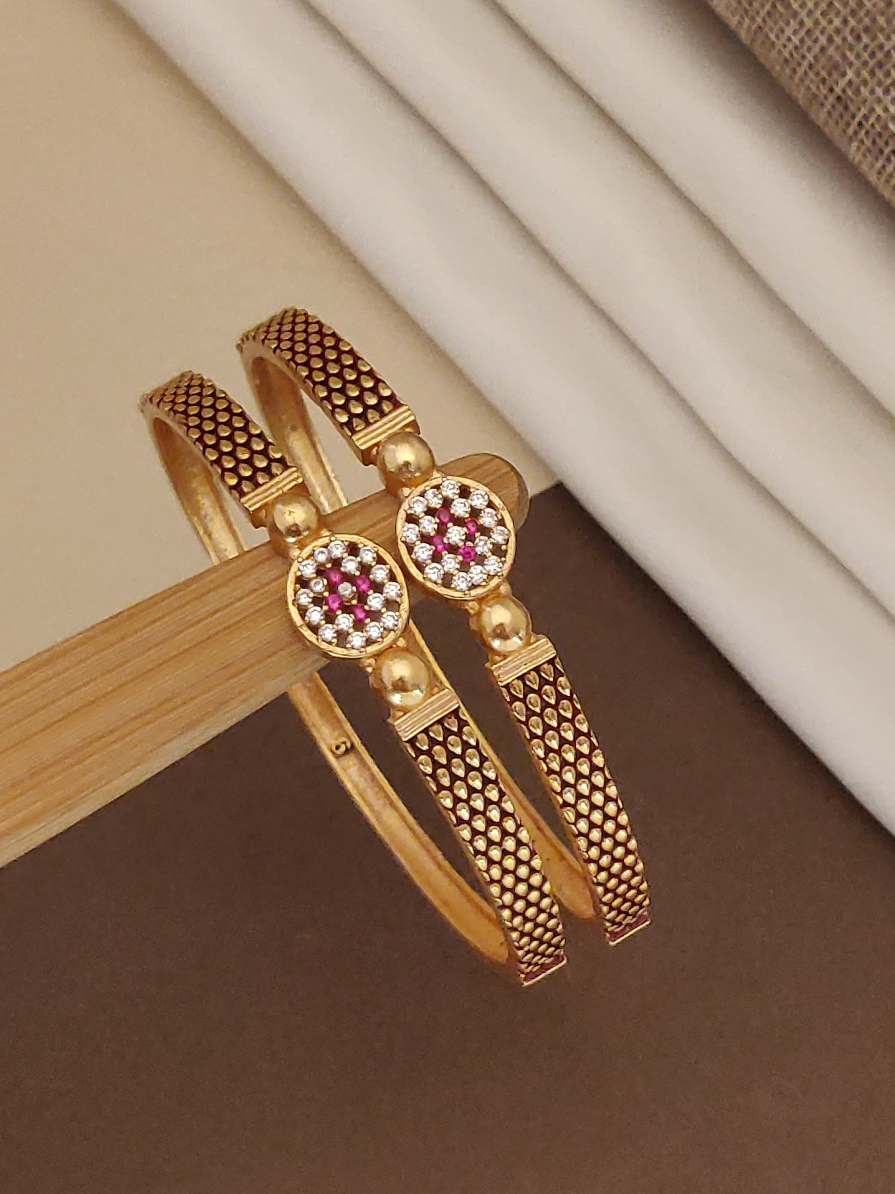 Elegant Gold-Plated Designer Bangles with CZ & Ruby Stones