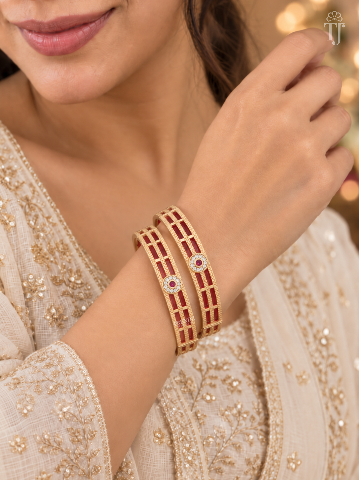 Woman wearing red white stone artificial bangles, festive outfit