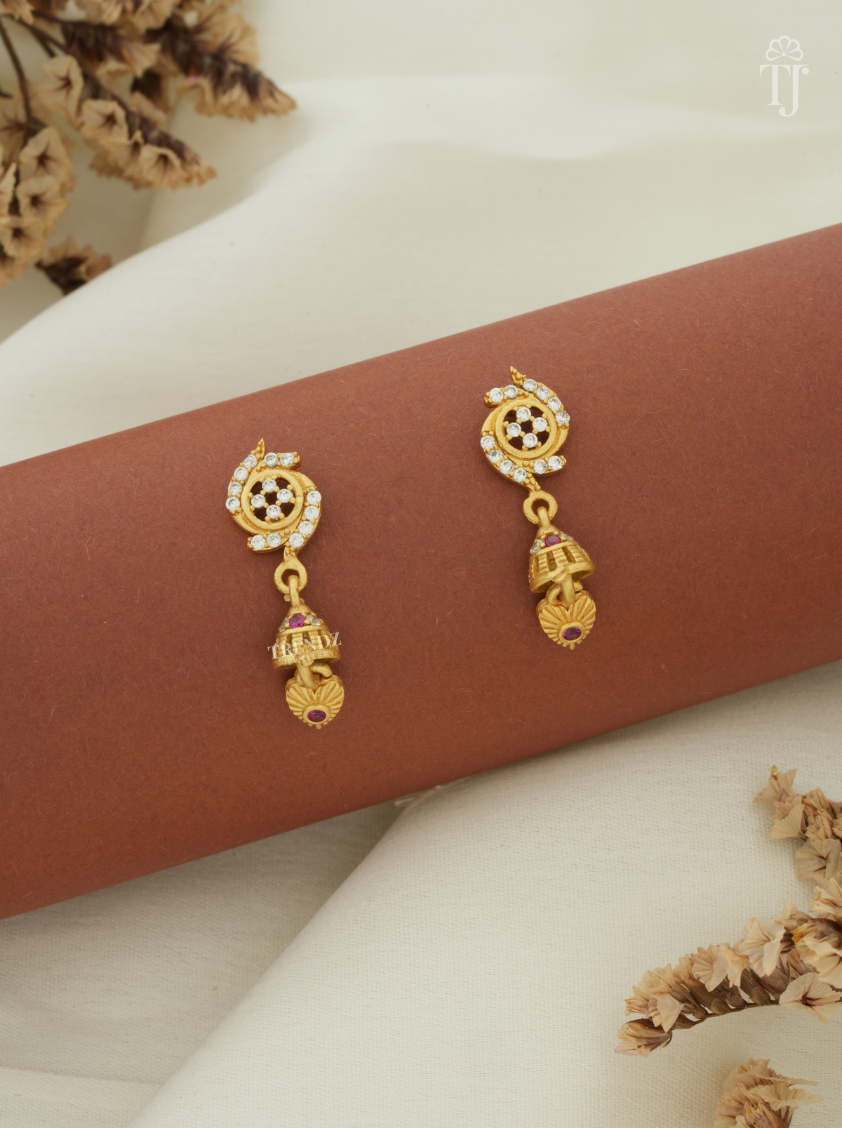 Gold plated artificial earrings for women with AD stone flower top and small jhumka drop
