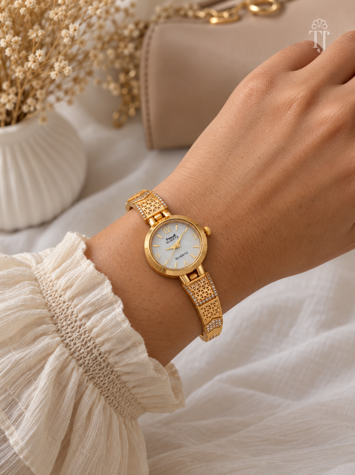 Festive Gold Plated Bracelet Watch for Women with Jali Design and AD Stones