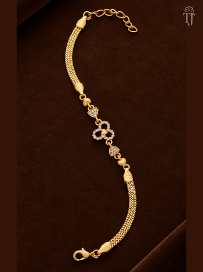 Heart bracelet for women, gold plated with three-ring AD stone flower charm on brown velvet