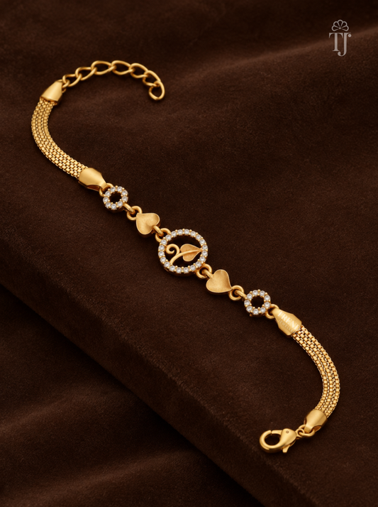 Leaf charm bracelet with mesh chain, lobster clasp and extender chain on brown velvet