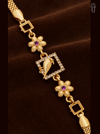 Close-up of gold parrot in white AD stone square with pink stone flower links