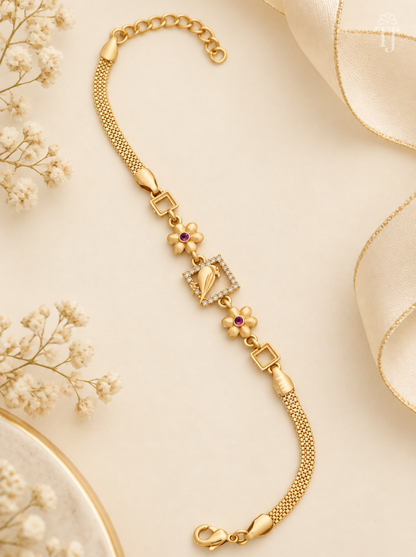 Parrot design bracelet, gold plated with AD stone square frame and pink stone flowers on cream background