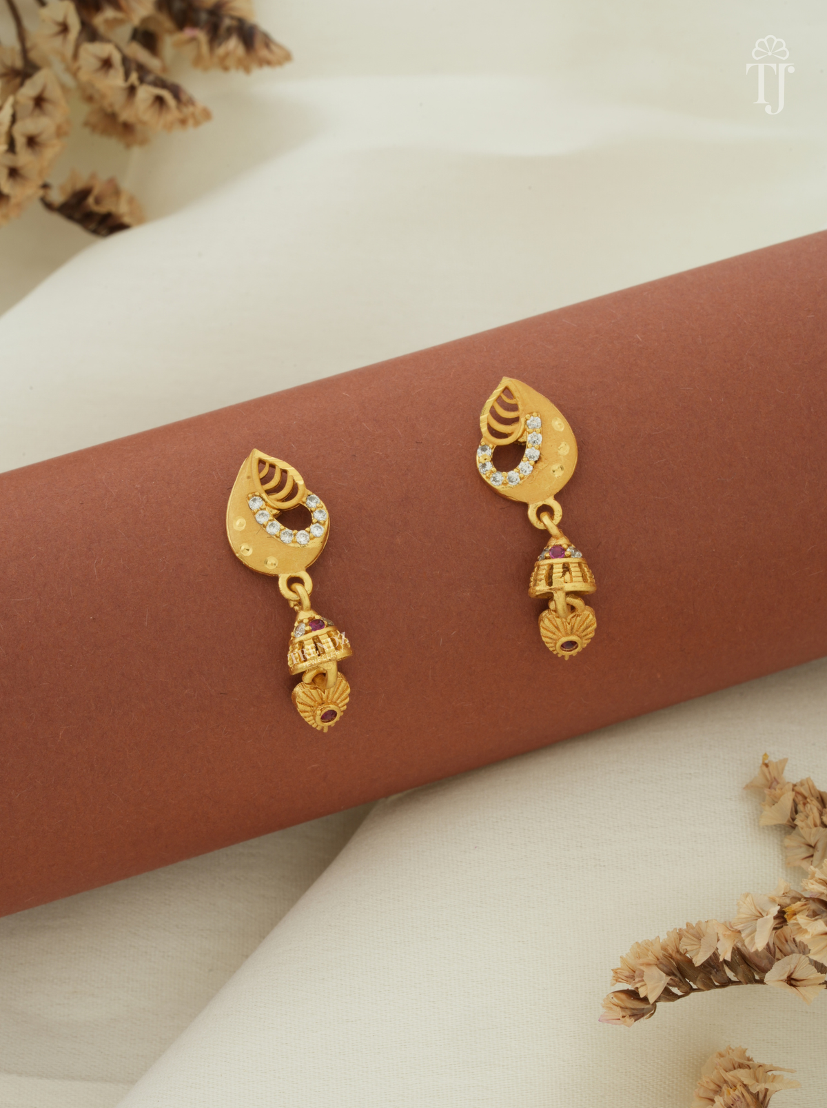 Trending earrings for girls artificial, teardrop gold top with AD stones and small jhumka drop