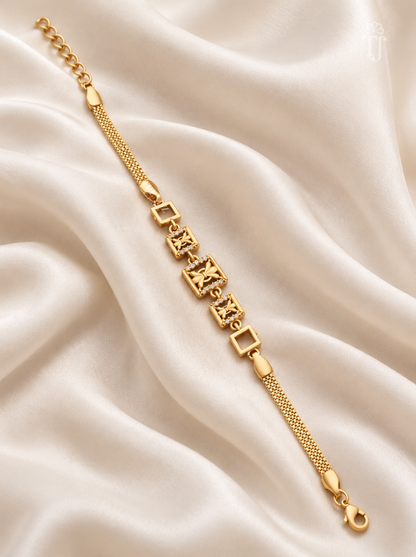Gold plated butterfly square link bracelet for women flat lay on white silk