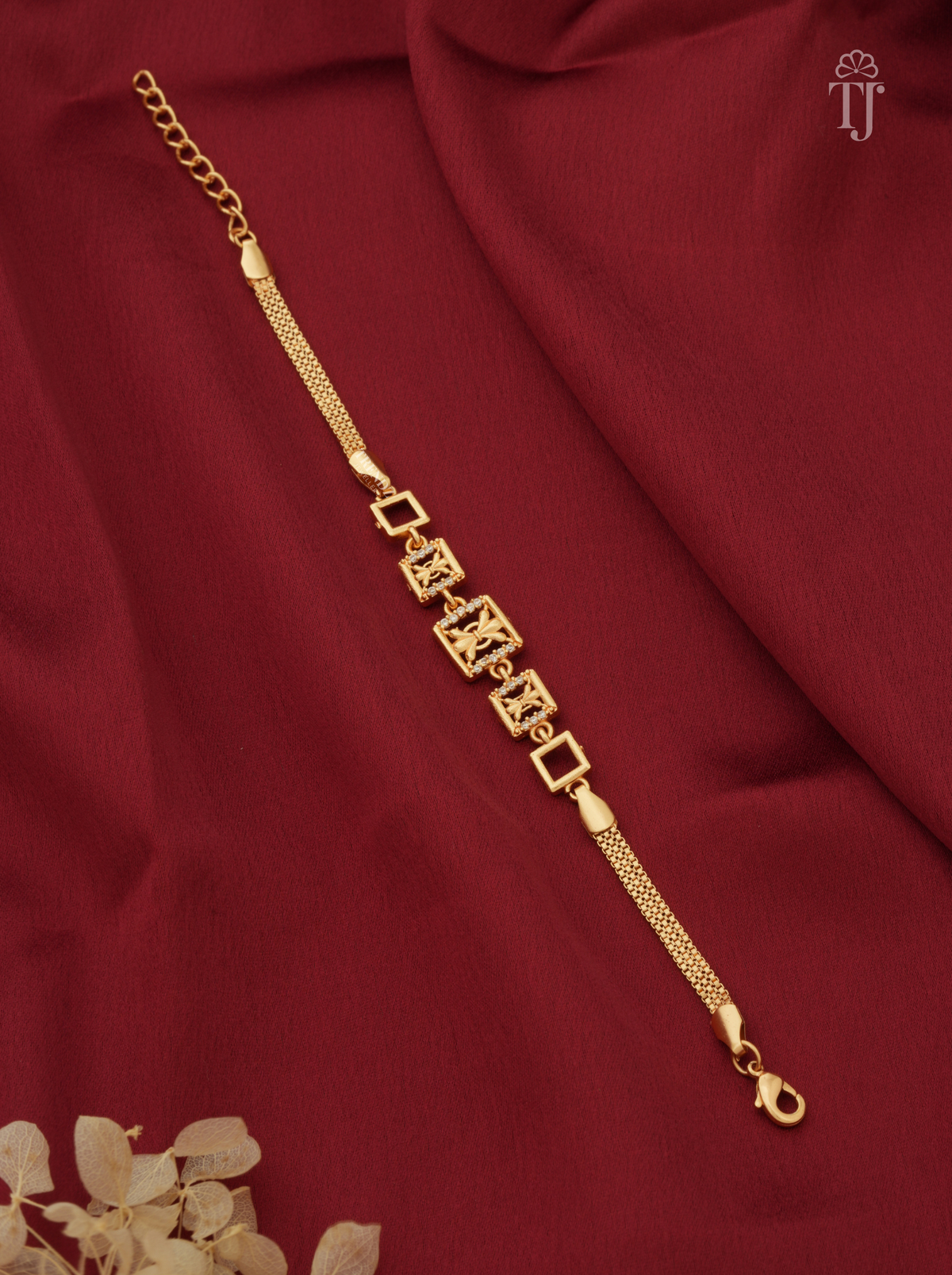 Gold plated designer bracelet for women and girls with AD diamond butterfly square links