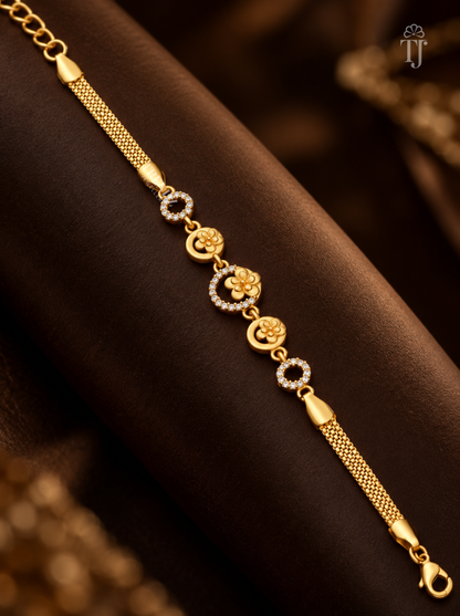 Gold plated floral designer bracelet with AD diamond on black fabric