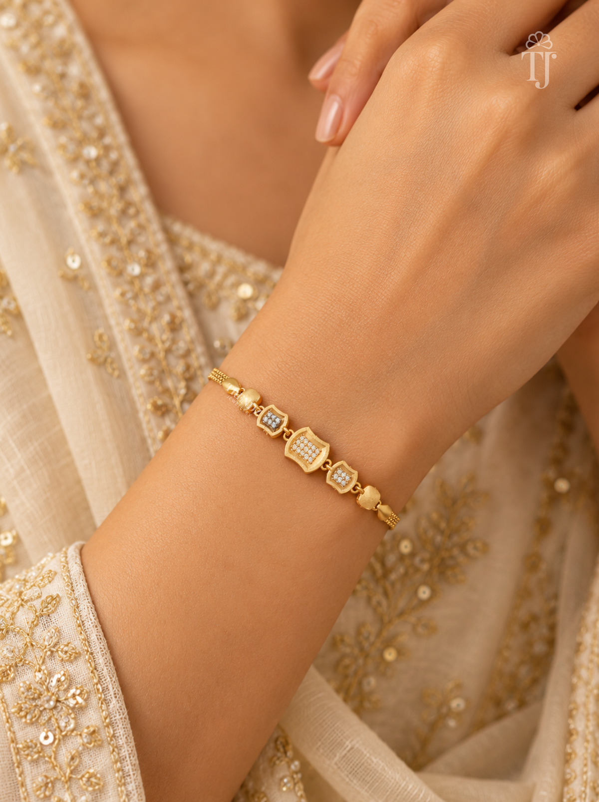 Model wearing modern geometric rectangle AD diamond gold plated bracelet on wrist