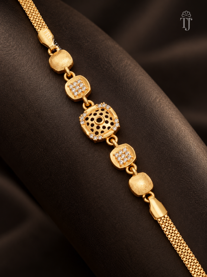 Close up of premium gold plated square bracelet with floral cutwork AD diamond on black fabric