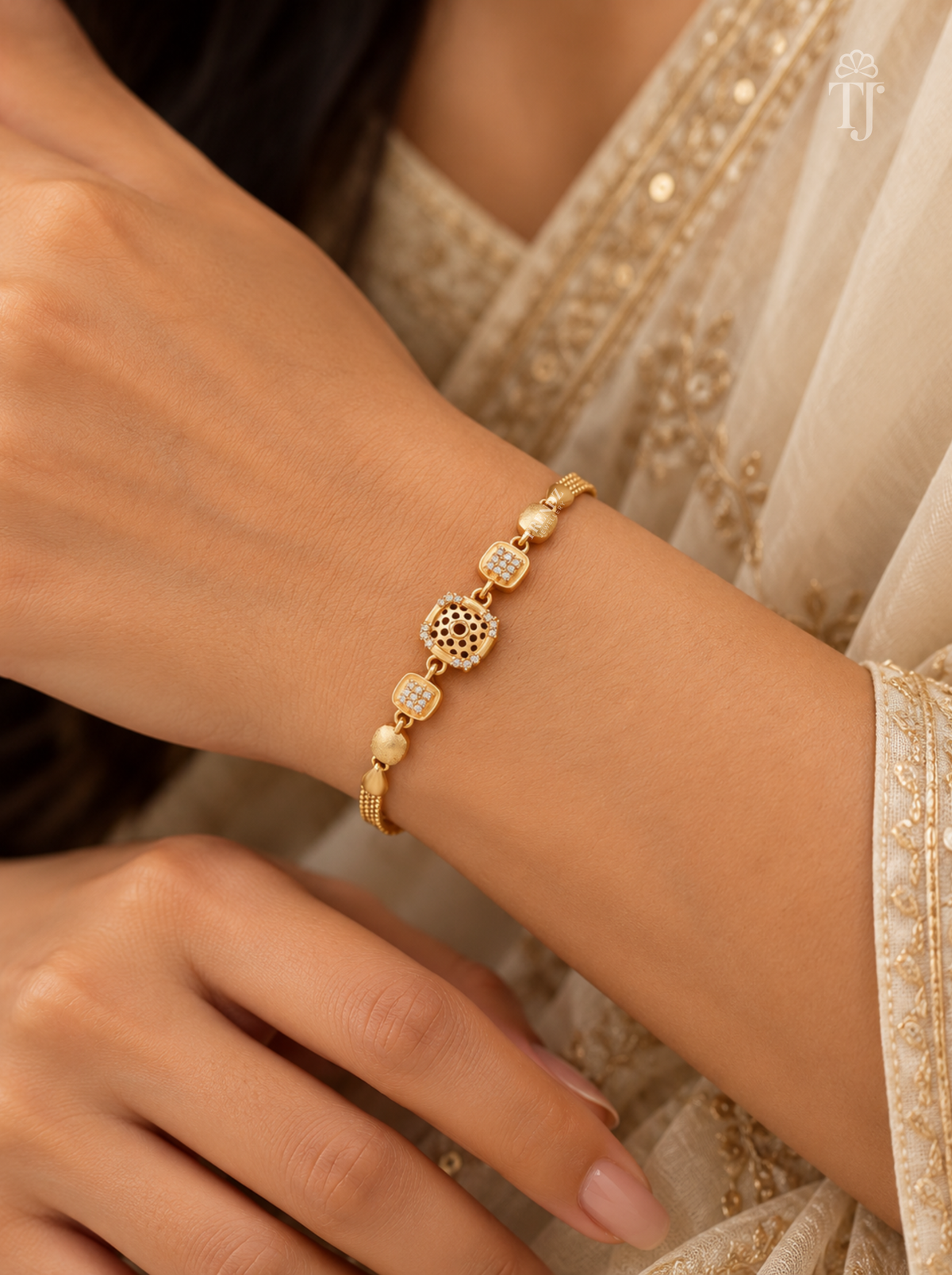 Model wearing premium gold plated square AD diamond designer bracelet on wrist