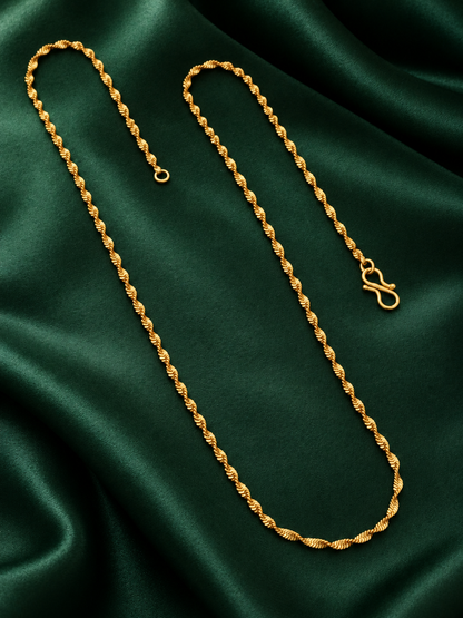 Thin twisted gold plated chain with S-hook on dark green satin